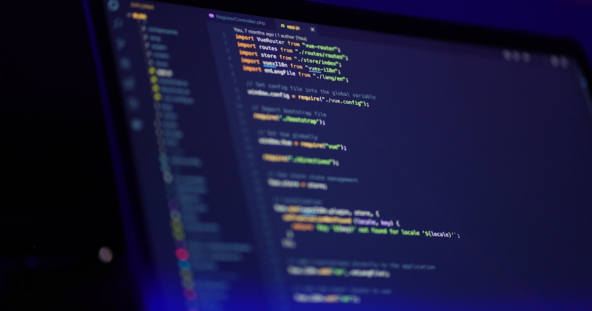 Lines of source code displayed on a laptop screen